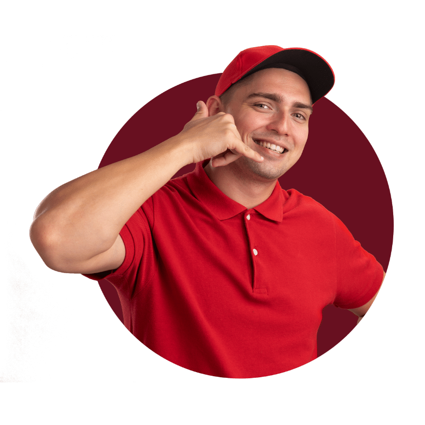 Smiling Young Delivery Man Wearing Red Uniform Polo Shirt and Red Cap doing Call Sign
